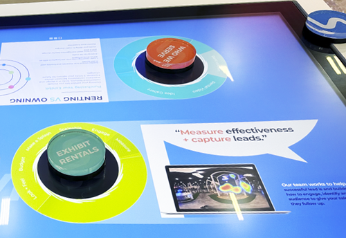 RFID pucks on the touchscreen table RFID pucks on the touchscreen table